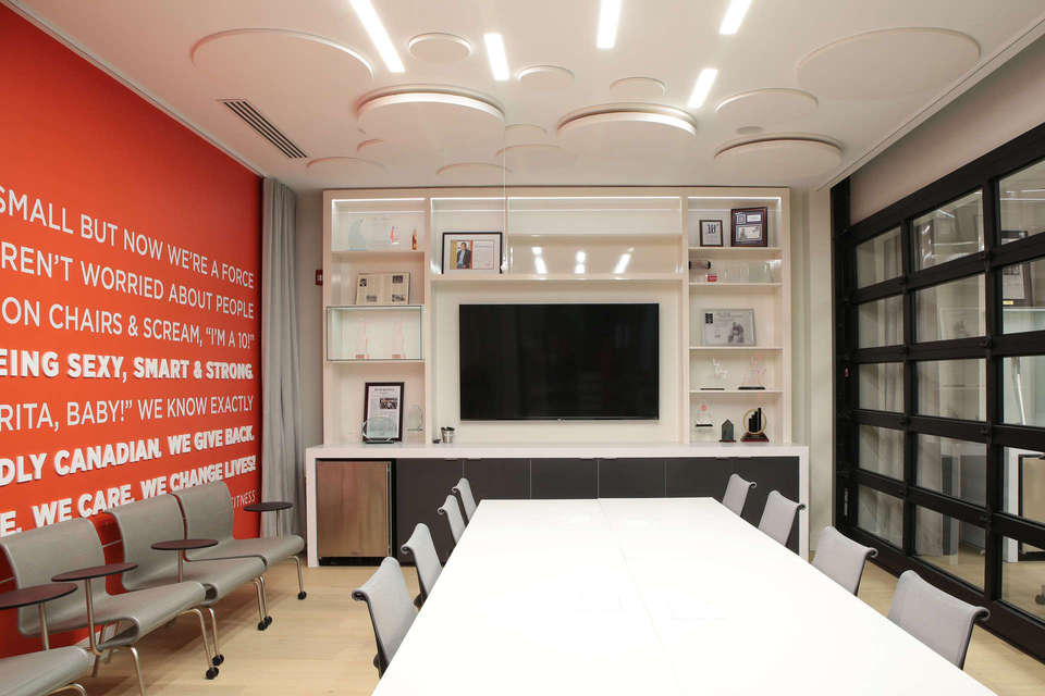 Custom millwork for modern boardroom, cabinetry, shelving & woodwork, a project in London Ontario.